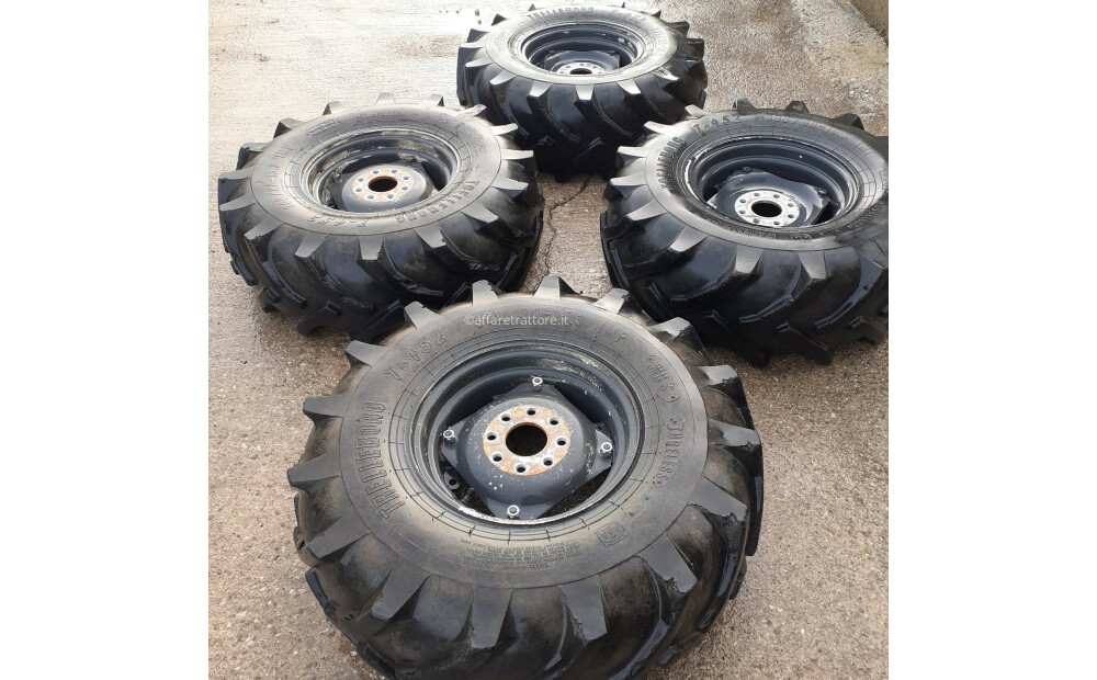 4 TIRES AND RIM Trelleborg 300-80-15.3 Used - 1