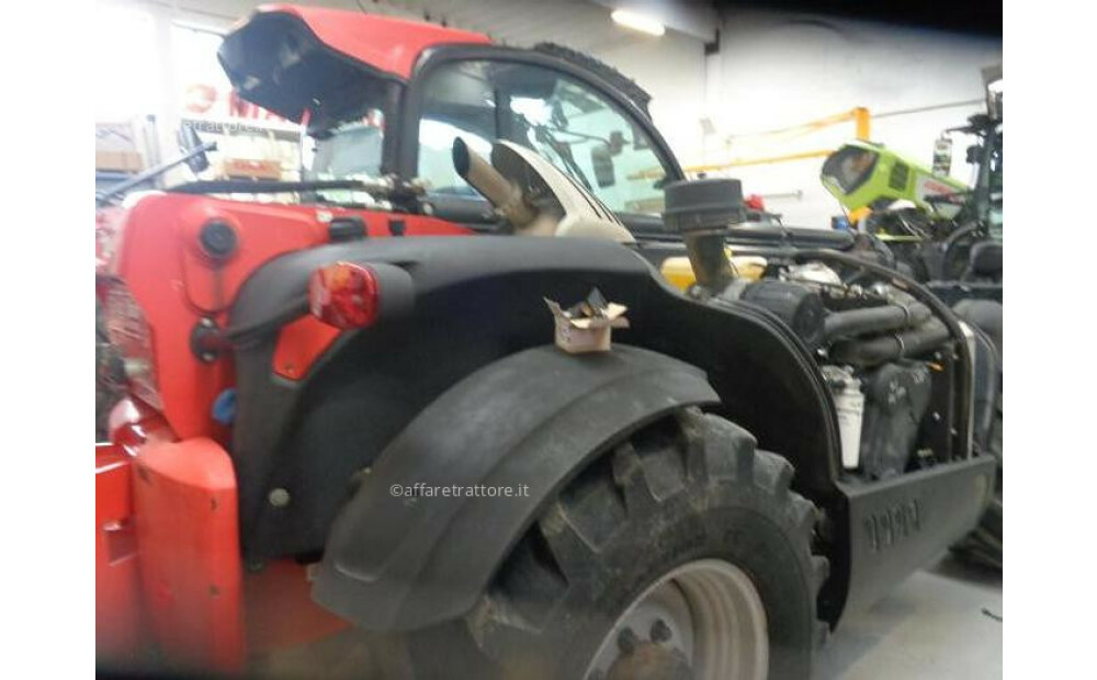 Manitou MLT 940- 140 Used - 3