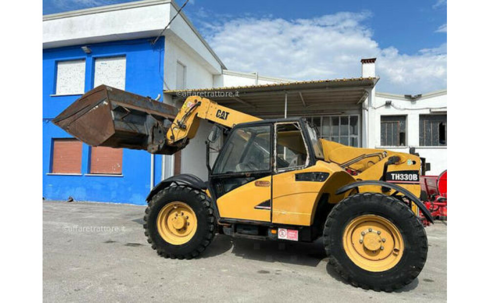 Caterpillar TH 330 B Used - 11